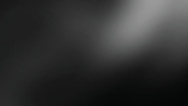 A smooth gradient of gray shades creates a minimalist, monochromatic background, evoking a sense of calmness and simplicity.black background vector