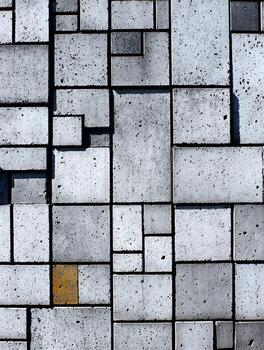 Abstract Grey and Gold Square Tile Pattern Background. This image features a detailed close up of an artistic tile arrangement. photo