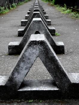 Geometric Concrete Blocks in a Row, Creating an Abstract Pattern. photo