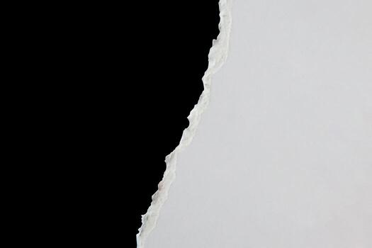 A hole in the wall with a piece of paper photo