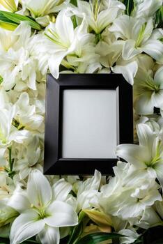 White lilies and black frame with empty space for text photo
