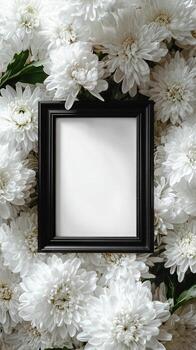 White flowers and a black frame with a blank space photo