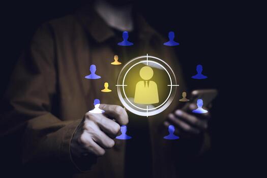 Hand pointing at digital icon of person in crosshair target, symbolizing customer targeting, user persona, digital marketing strategy, HR recruitment, and audience segmentation in business. photo