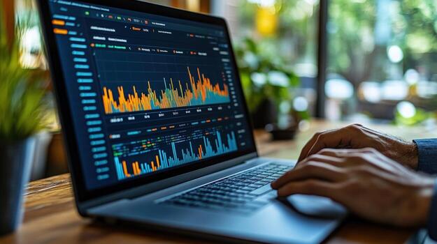 Laptop displaying business data graphs and analytics for investment analysis photo