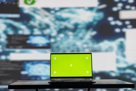 Surrounded by data and neural networks systems, laptop in empty space shows copy space screen for artificial intelligence automation and development. High tech data visualization. photo