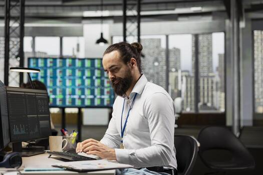 Office employee engages in brainstorming sessions and data analysis, leveraging insights and technology to align the strategy with objectives and support for efficient project execution. photo