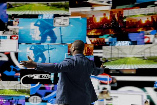 Black social media manager browsing high tech environment with app interfaces, infographics and social networking feeds. Showcases big data on social media platforms, multimedia. photo