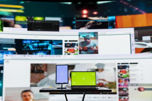 Mockup devices and multimedia collage illustrating entertainment concept. Mockup notebook with tablet and interactive digital interface showcasing diverse internet media clips photo