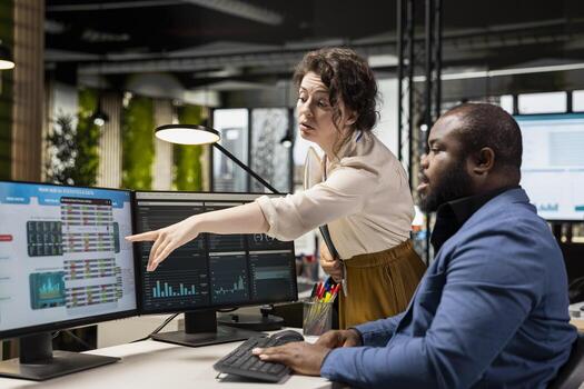 Colleagues engaging in discussion and consulting around performance metrics, leveraging insights to align objectives and achieve business goals efficiently in a multinational company. photo