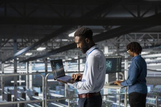 IT experts on data center industrial platform pleased by neural network outputs after completing AI software updates. System administrators team finetuning server rig configurations. photo