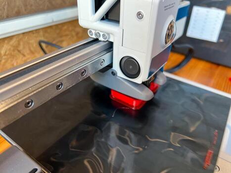 3d printer creating an object layer by layer using fdm technology photo
