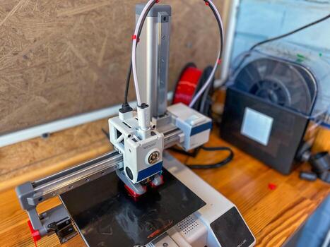3d printer creating object layer by layer with fused deposition modeling photo