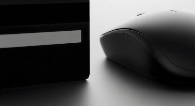 Minimalist Close-Up of a Computer Mouse and Desktop Device photo