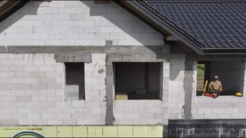 Man Working on Construction of House video