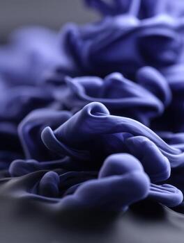 A close up of a blue liquid on a surface photo