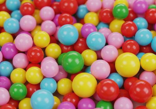 A vibrant collection of colorful round balls creates a playful and textured background photo