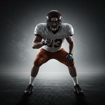 Intense Athlete in Ready Position with Determined Gaze on Modern Backdrop. photo