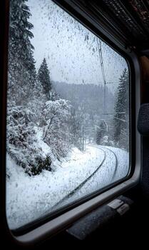 Winter wonderland journey view through train window snowy landscape in motion with forest and tracks creating a serene and captivating travel experience on a cold day snow photo