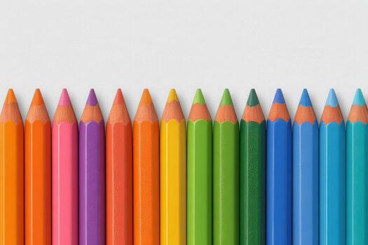 Sharpened colored pencils in bright hues are arranged in a neat row against a plain background. The vivid colors create a vibrant display, highlighting the tips and their different shades. photo