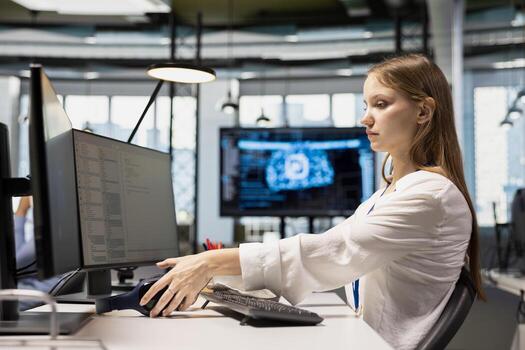 Junior dev speeding up tasks by following AI language model suggestions in office. Young woman relying on artificial intelligence LLM assistant to fix mistakes during startup internship photo