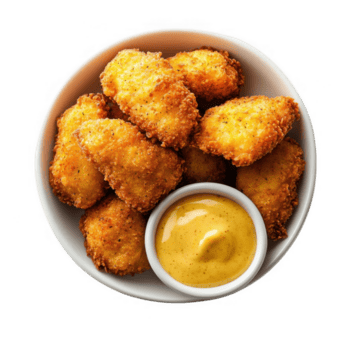 uma tigela do frito frango pepitas com mostarda molho png