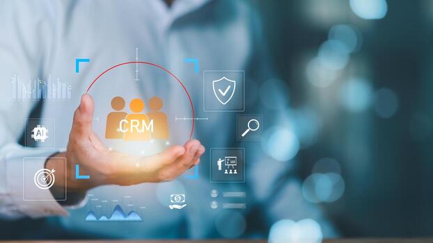 Businessman holding CRM icon with digital interface showing AI, data analysis, security, customer engagement, representing modern CRM solutions for digital marketing ,customer relationship strategy photo
