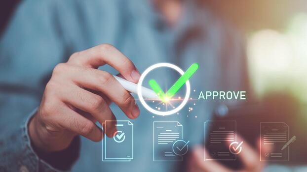 Digital approval concept featuring hand using stylus with check mark icon, document validation, electronic signature, and automated verification process in a paperless business environment. photo