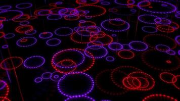 gloeiend concentrisch cirkels Aan donker achtergrond lus geanimeerd video
