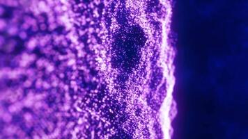 A mesmerizing field of tiny glowing purple particles forming a wave-like structure video