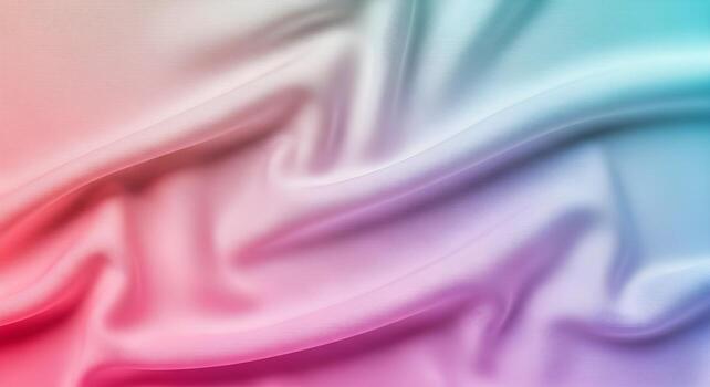Close-up shot of smooth silk fabric in pastel gradient tones under natural light, forming a soft abstract background with sharp edges, no blur, and no human presence photo