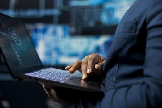 High tech black IT expert working with AI brain data structures environment, illustrating computer science and automation tools for machine learning. Implementing neural networks systems. photo