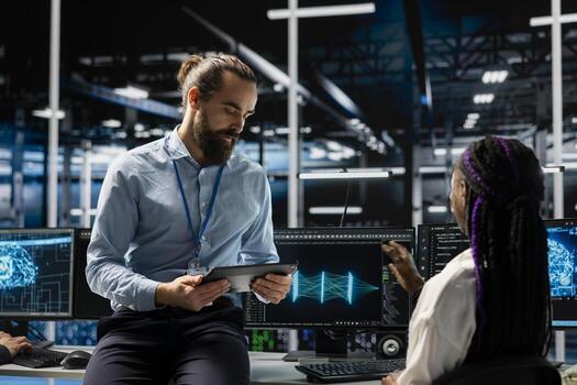 Data center manager and intern adjusting AI model parameters to upgrade systems. Server room IT team leader and trainee scheduling machine learning ran maintenance for hardware components photo