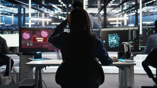 Stressed server hub admin worried by malfunctioning data analytics AI generator. Anxious data center worker concerned by critical error in artificial intelligence tool showing system metrics, camera A photo