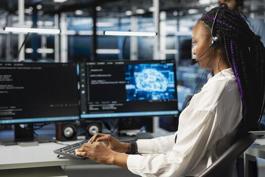 Data center admin speaking in headset mic, using AI assistant to provide user technical support. Server hub IT professional assisting clients during remote call using artificial intelligence photo