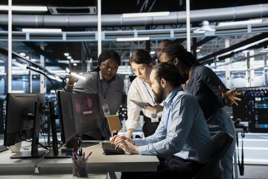 Engineers reviewing AI systems alerts after detecting irregular network activity patterns. IT team evaluating flagged events using artificial intelligence threat detection tools photo