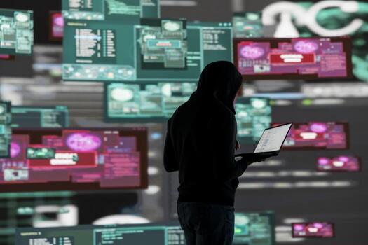 joven chico hacker rotura dentro un sistema en sigilo modo por programación código, eludiendo cortafuegos y explotando vulnerabilidades en red seguridad a llevar fuera ciber ataque y infiltración. foto