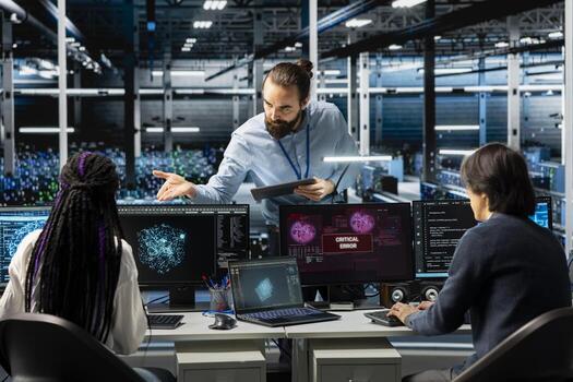 Data center manager overseeing team of technicians trying to fix malfunctions while using AI tools. Server farm team leader supervising coworkers optimizing system health, fixing critical error photo