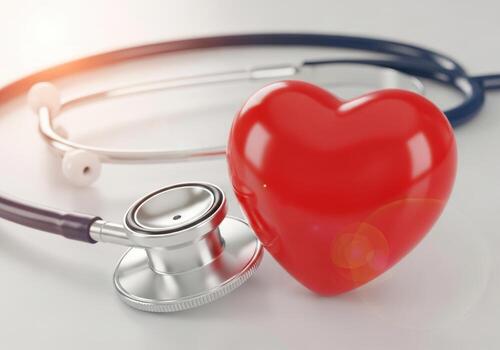 Red heart and stethoscope symbolizing health and care photo