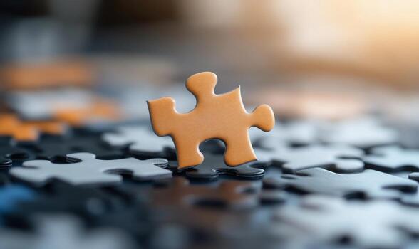 A single puzzle piece stands out from the rest, representing the importance of finding the right solution. photo
