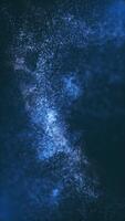 lysande blå partiklar abstrakt bakgrund med atmosfärisk bokeh ljus och grund djup av fält. detta eterisk vertikal rörelse bakgrund animering är full hd och looping. video