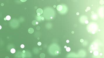 mjuk grön bakgrund med lysande bokeh cirklar och ljus blekna video