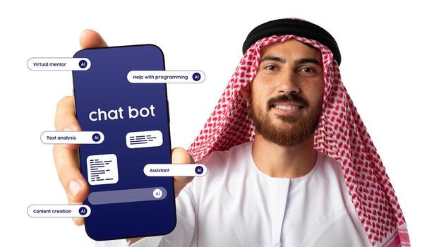 hombre en tradicional atuendo muestra teléfono inteligente exhibiendo chatbot caracteristicas para programación asistencia y contenido creación foto