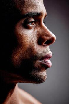 Man looking to the right in studio photo