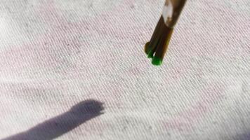 Brush stroke animation. creating vibrant green art on canvas with dynamic movement and natural shadows. video