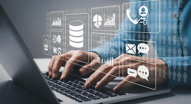 Hands typing on a laptop with a futuristic digital interface displaying data and icons for business and technology photo