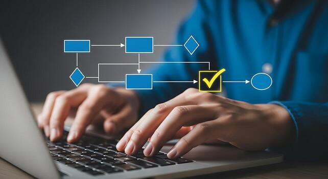 Person working on a laptop with a digital flowchart and workflow visualization appearing above the keyboard indicating process and data flow management photo