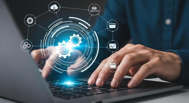 Man typing on laptop with futuristic holographic gear interface showing digital connections and data flow photo