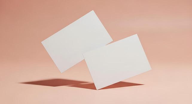 Abstract geometric shapes floating and casting shadows on a soft peachy background photo