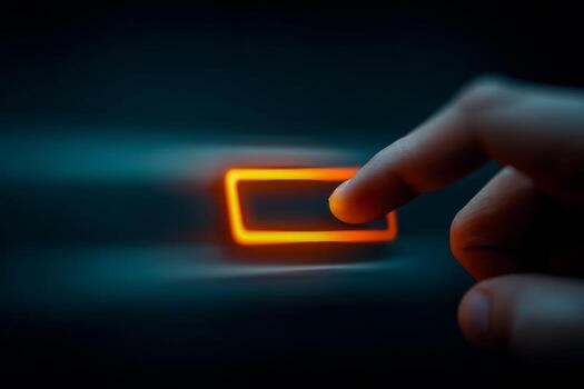 Person pressing a glowing rectangular button in a dark setting photo