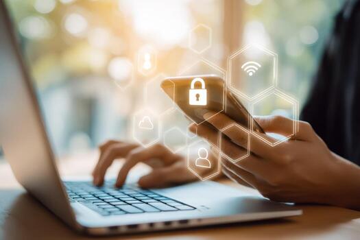 Digital security and data protection concepts on mobile device and laptop photo